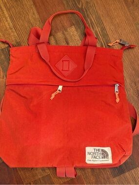 The North Face Orange Canvas Tote Backpack with Front Zip Pocket